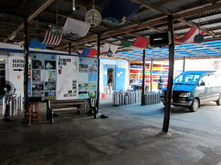 The arrival area at Sam's Tours. Tanks are lined up for loading on the diveboats.
