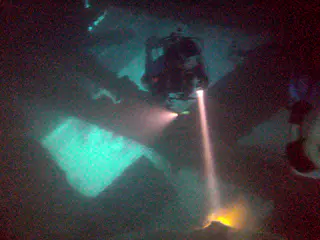 Penetrating the wreck's cargo holds.