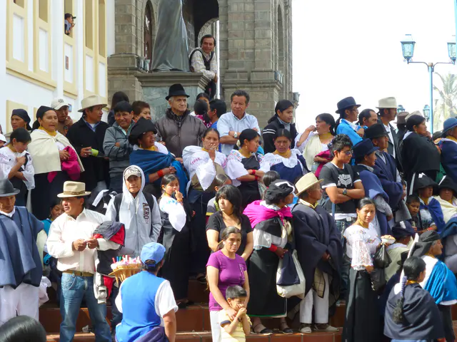 Crowd watches from the steps of the Church. Per wikitravel.org website, "Cotacachi Village is a small town of 20.000 inhabitants some 20km north of Otavalo. The town is famous for its leather goods."
