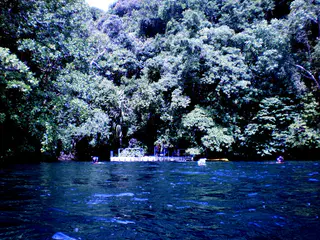 Floating dock entrance to Jellyfish Lake, Palau. Access requires a hike from the dive boat dock over the hill shown in the photo.