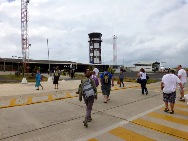 Heading toward the open air airpot immigration, customs, and mandatory collection in cash of $100 for our Galapagos National Park entry fee.