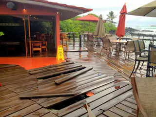 The night of July 5 was one of rain and violent seas. The waves ripped up the outer deck of the Red Mangrove Restaurant at our Lodge.