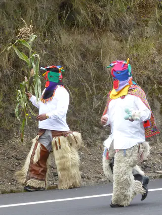Encountering a fiesta / procession on the road to Otavalo.