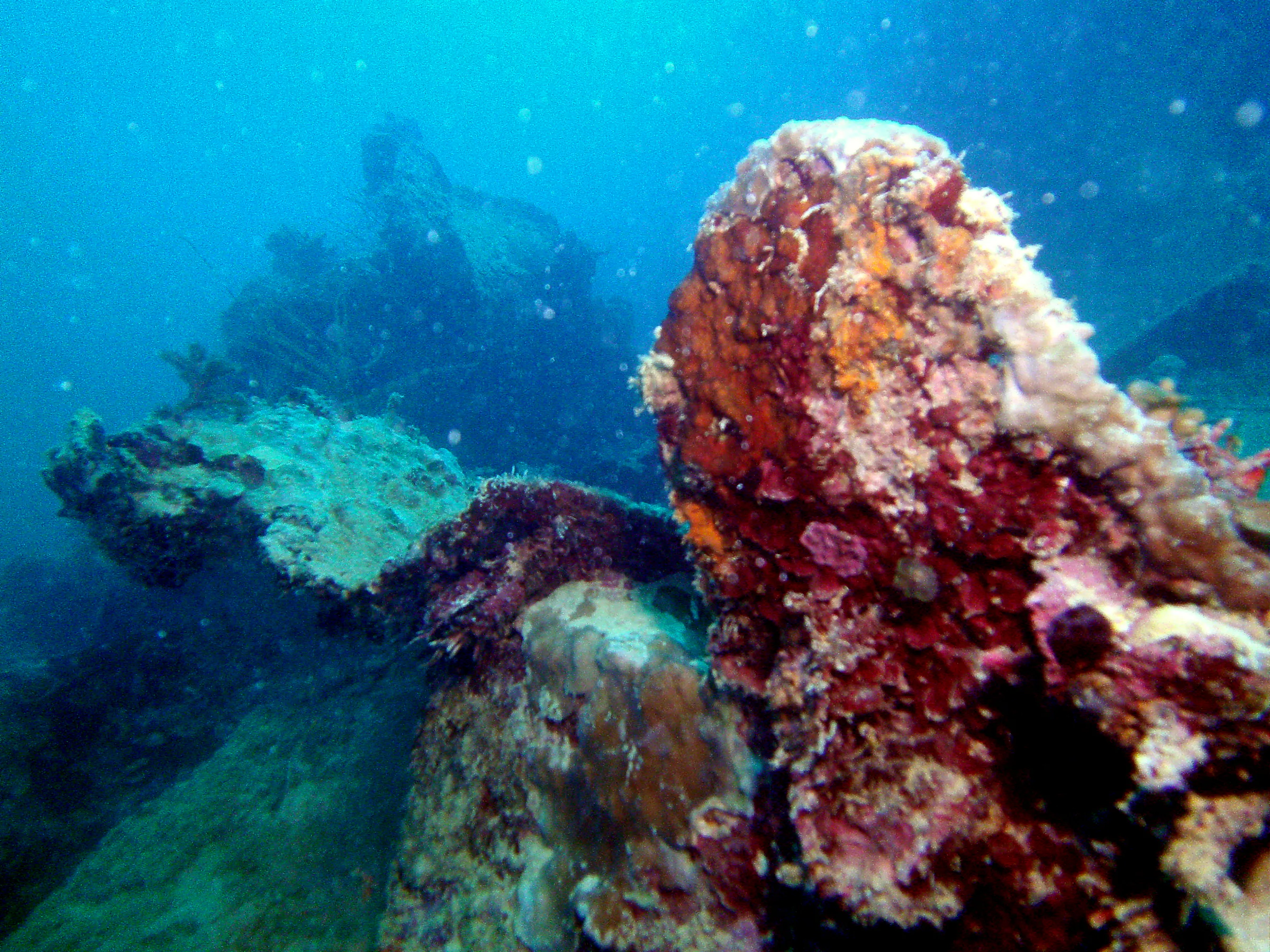 Twisted wreckage on the main deck of the WWII Wreck Nagisan Maru.