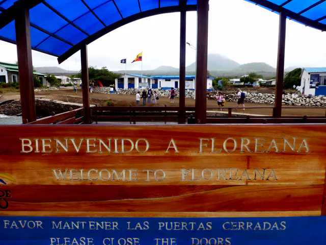 Floreana - Welcome to Floreana sign at its harbor.