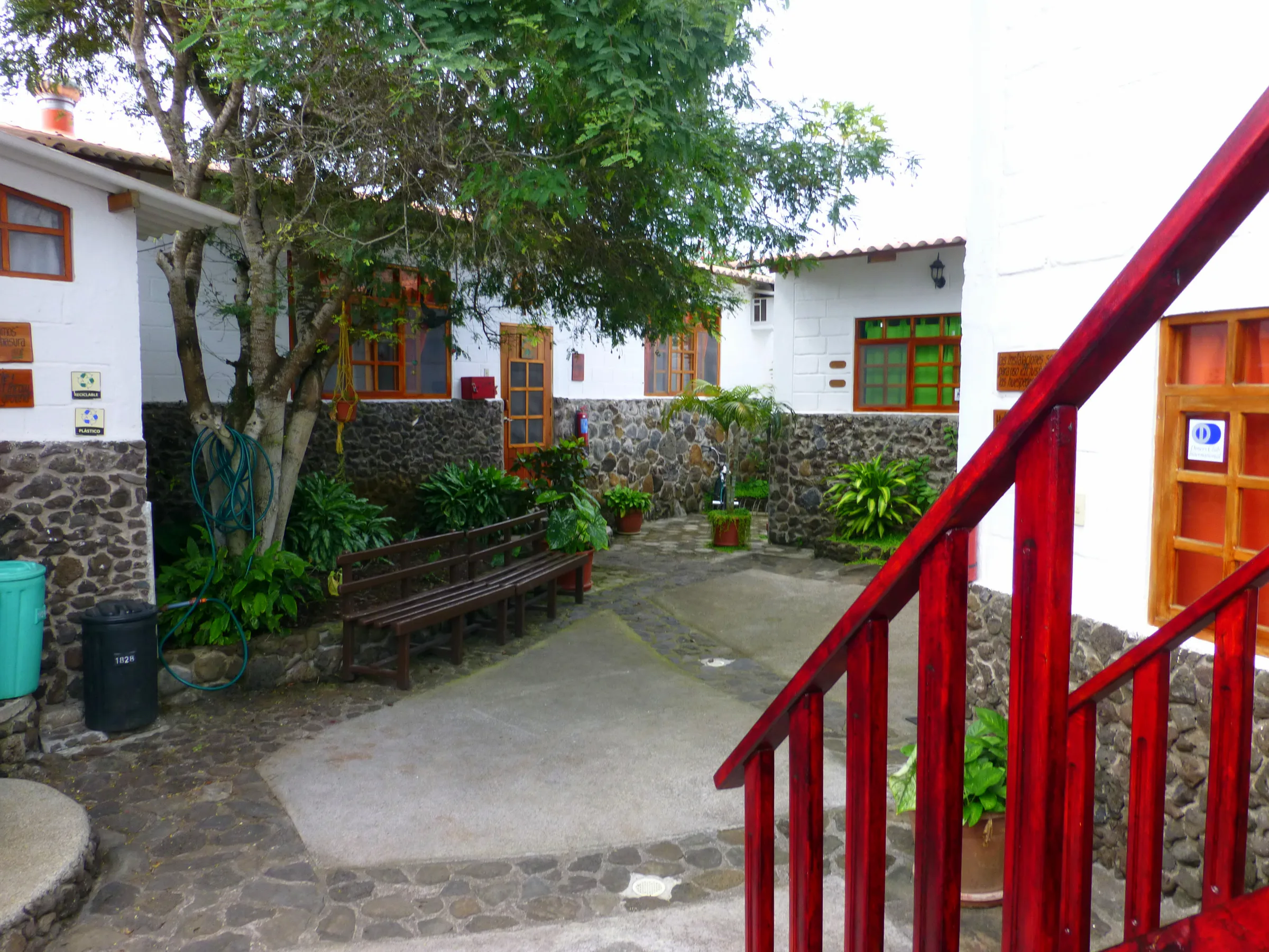 Looking toward the dining area at the Pimampiro Hosteria, Puerto Baquerizo Moreno.  July 6 - 8, 2012. Stairs in foreground led to our room.