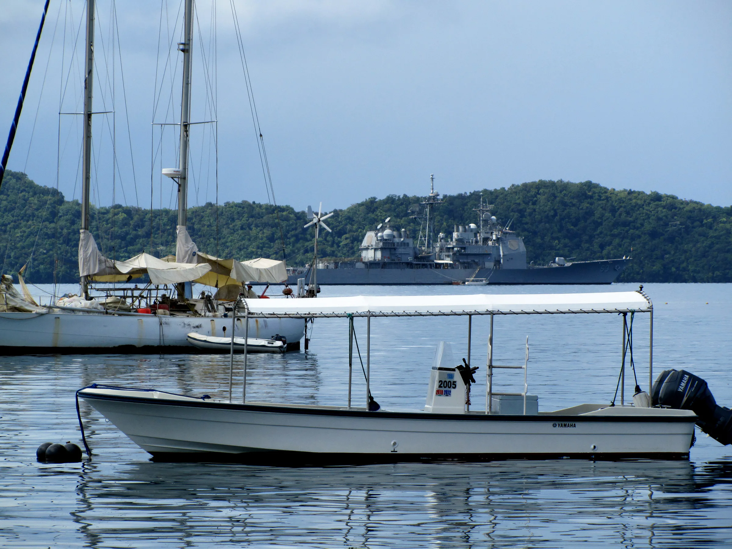 Looking toward the USS Cowpens, a ship that moored in the harbor on Jan. 22 for some R & R for its sailors. In the foreground is a diveboat that can be used to transport snorkelers and divers to the Rock Islands.
