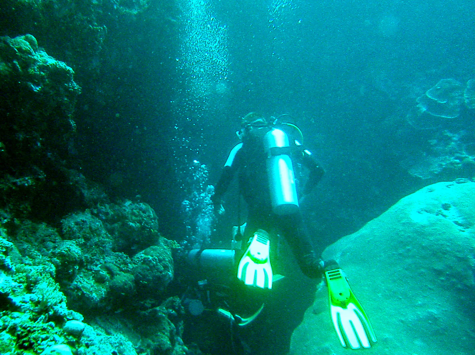 We prepare to enter a cave a short distance from the exit of the Blue Holes.