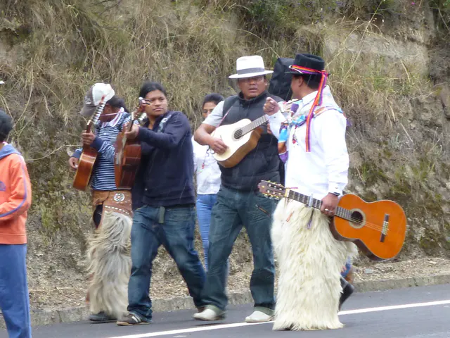 Encountering a fiesta / procession on the road to Otavalo. (Streaks in the photo are from the rain.)