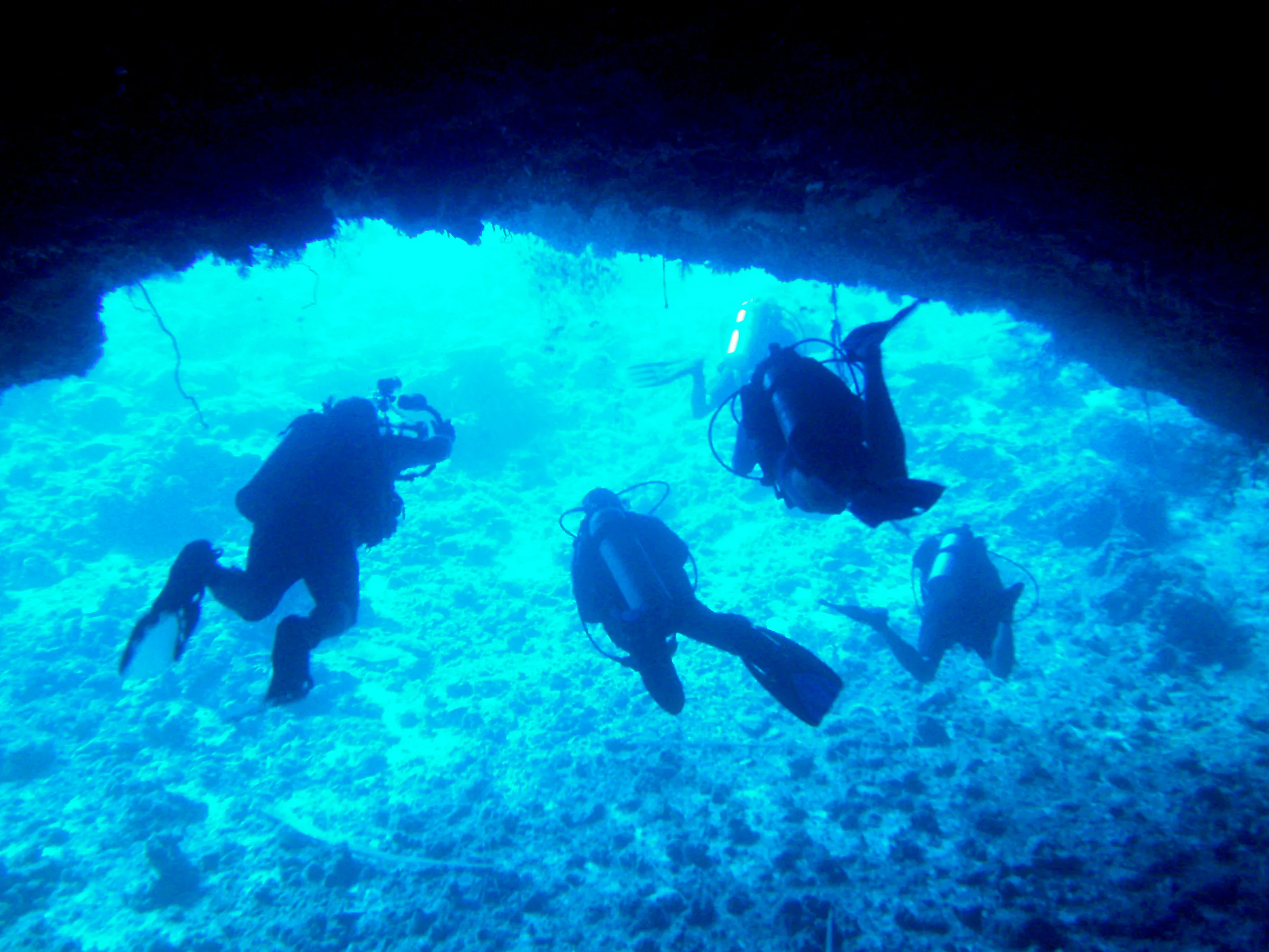 Exiting the Virgin Blue Hole, Palau.  We remain in the upper part of the cavern (at 90' to 100') because the cavern is quite deep.