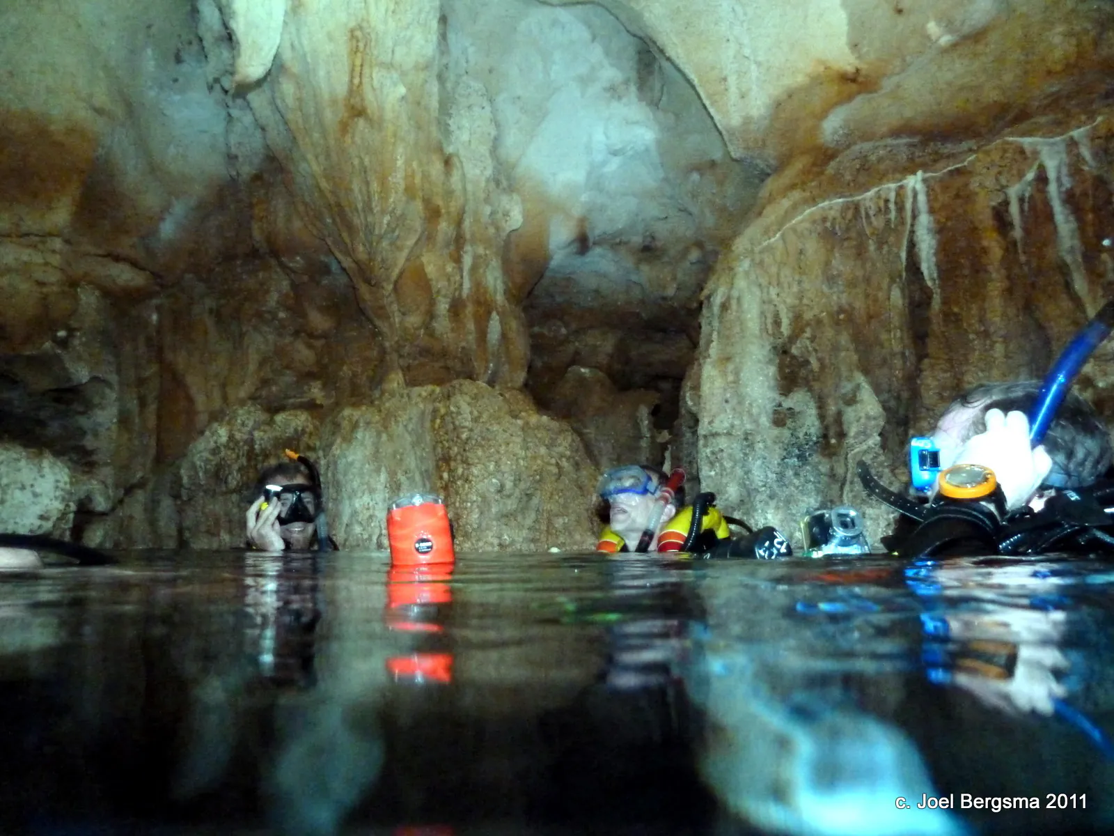 2011-01-14 Chandelier Cave.  Surfacing in the first chamber. Photo courtesy of Bill Ring. c. Bill Ring 2011.