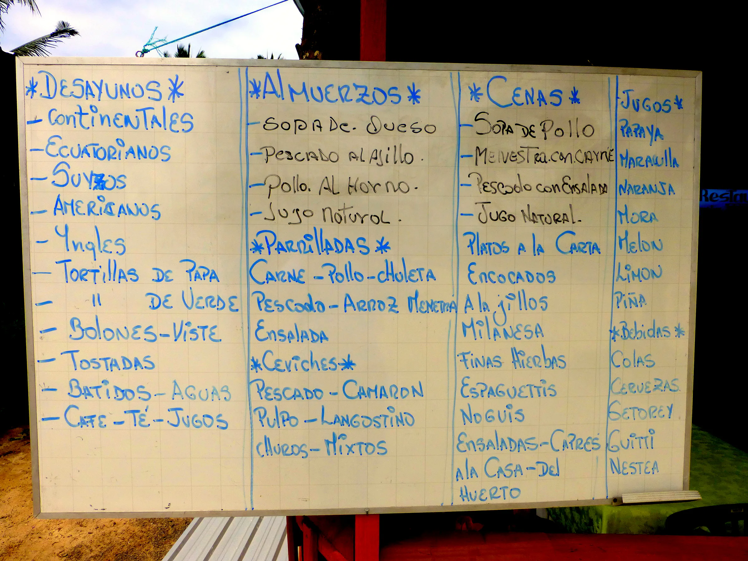 Restaurant menu in Puerto Villamil.