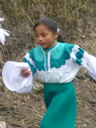 Encountering a fiesta / procession on the road to Otavalo.