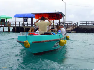 Heading over to Los Tintoreras in our ferry boat from the dock at Puerto Villamil.