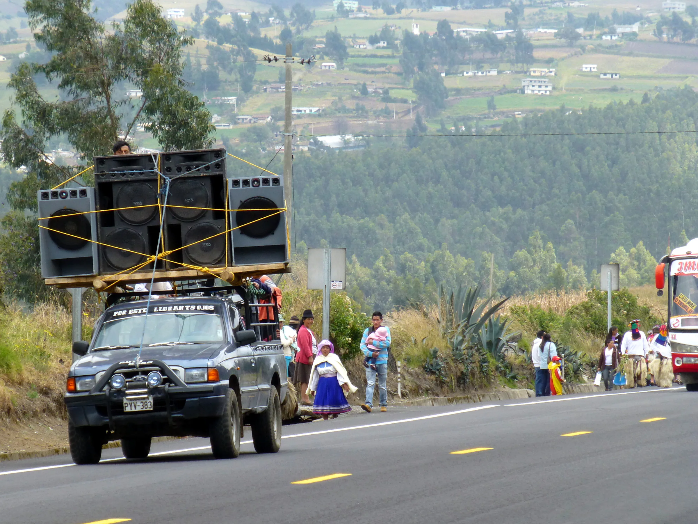 Encountering a fiesta / procession on the road to Otavalo.