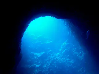 Looking toward an entrance to one of the blue holes from inside the cavern.