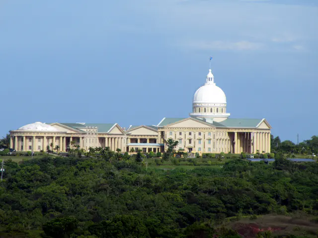 Palau's capitol building. The EU sponsored solar panels are on top of the car port on the right center of the photo.
