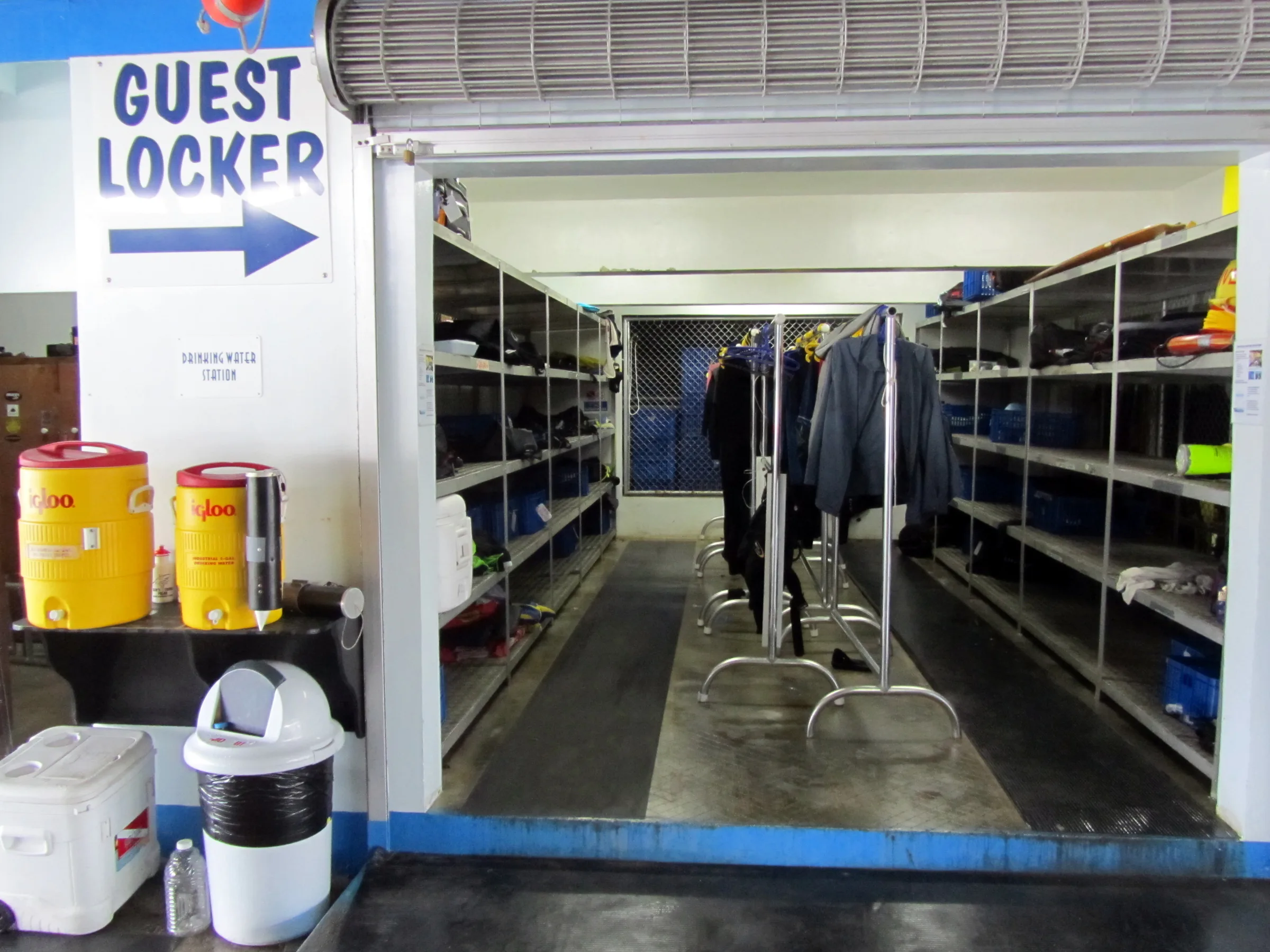 Guest Locker mid-day.  We stored our dive gear each night in the guest locker.  Our drinking water came from the yellow coolers shown on the left side of the photo.
