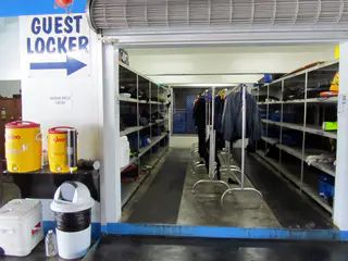 Guest Locker mid-day. We stored our dive gear each night in the guest locker. Our drinking water came from the yellow coolers shown on the left side of the photo.