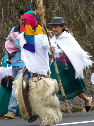 Encountering a fiesta / procession on the road to Otavalo.