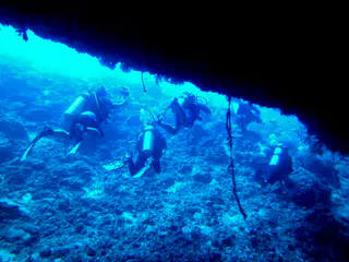 Exiting the Virgin Blue Hole, Palau.  We remain in the upper part of the cavern (at 90' to 100') because the cavern is quite deep.