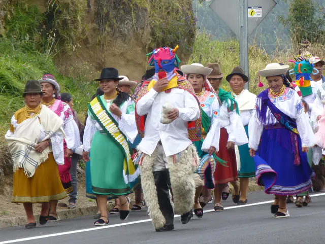 Encountering a fiesta / procession on the road to Otavalo.