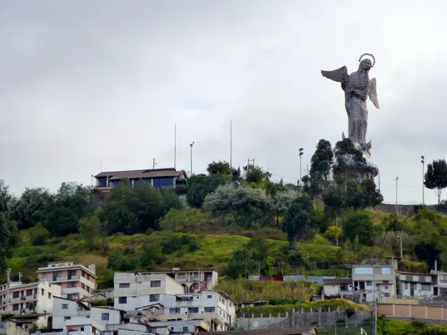The Pim Restaurant is on the left and the winged Madonna on the right.