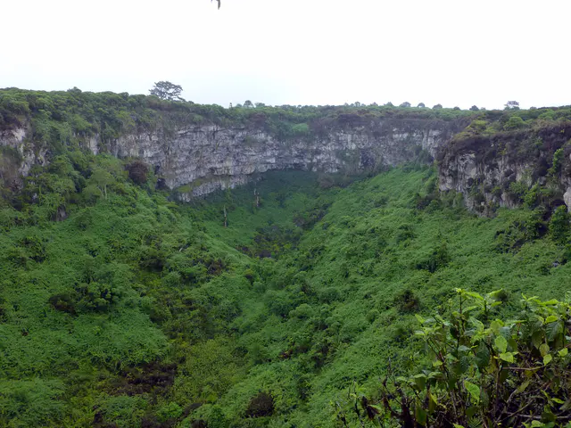 Collapsed volcanic crater on the west side of the road.