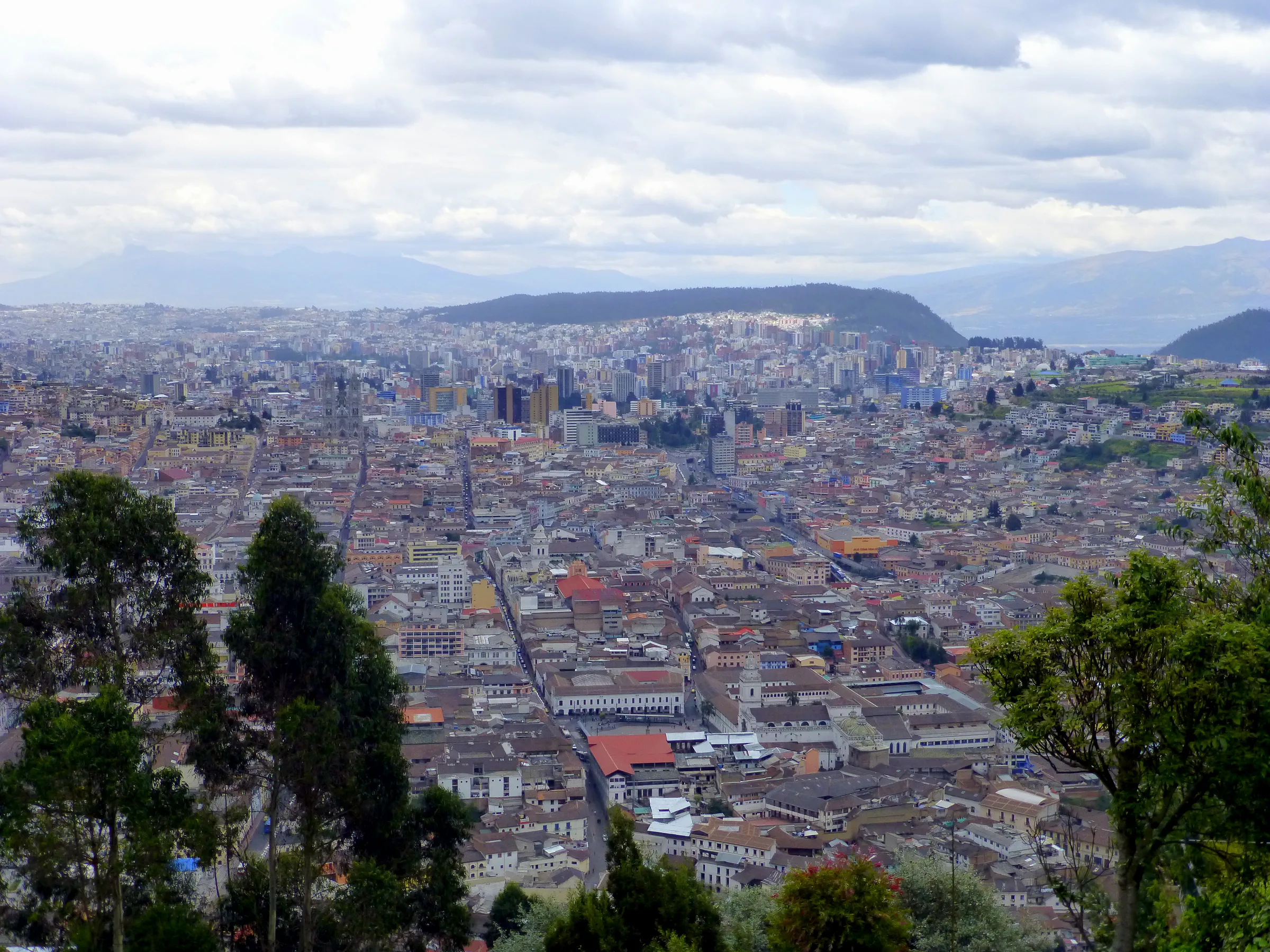 El Panecillo.  The old city of Quito lies below our luncheon restaurant Pim's, near the top of El Panecillo, 3,016 meters above sea level.
