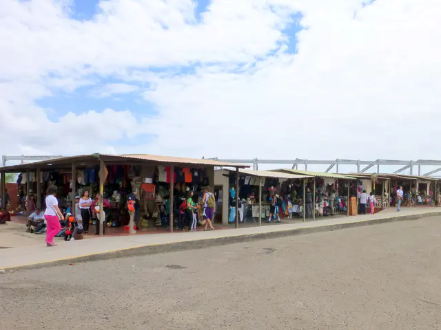 Baltra airpot handicraft shops, with the new, environmentally friendly airport terminal beginning construction behind.