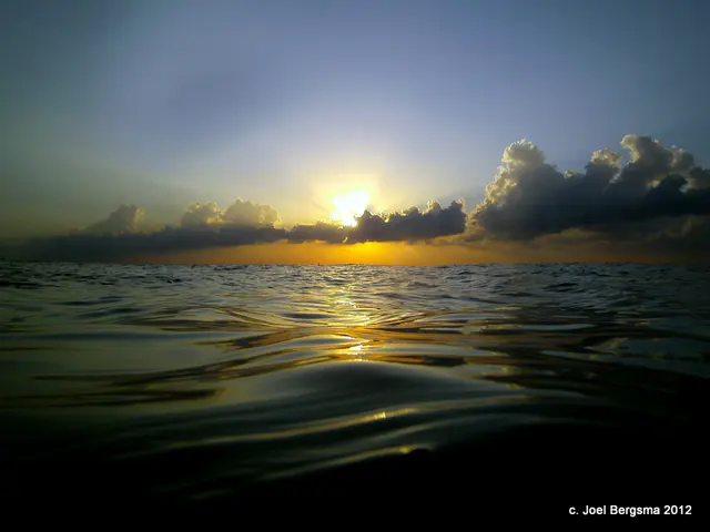 Twilight sunset, taken from the water immediately before descending to begin our twilight - night dive.