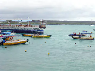 These taxi boats in Puerto Ayora ferry passengers to and  from the cruise ships and across a channel separating the town.
