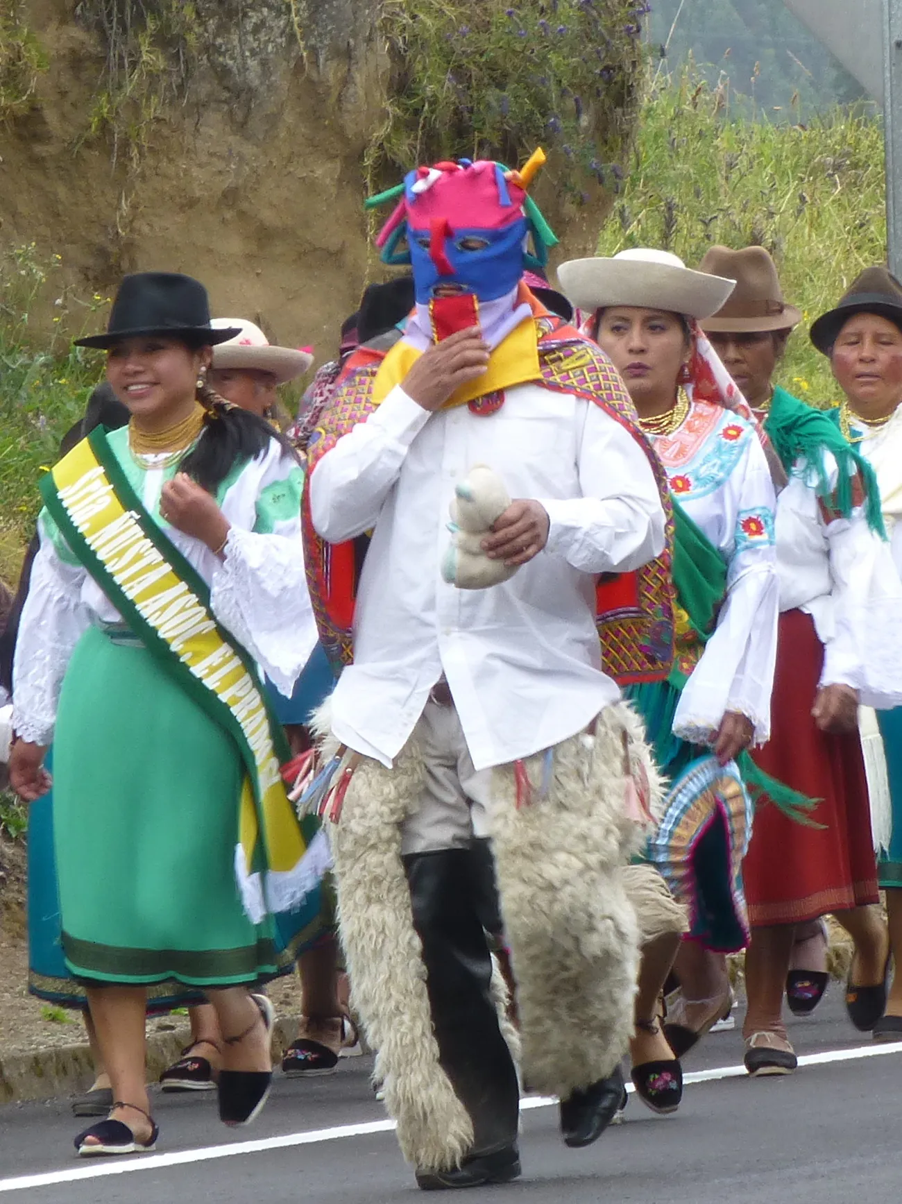 Encountering a fiesta / procession on the road to Otavalo.