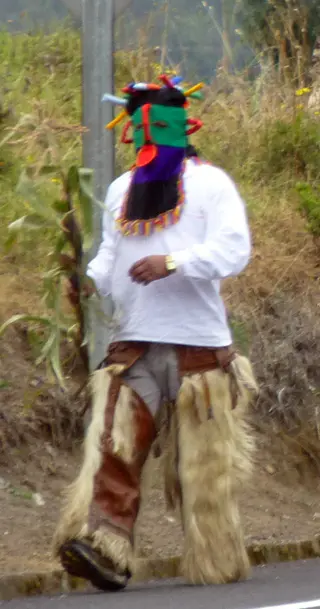 Encountering a fiesta / procession on the road to Otavalo.