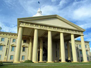 Entrance through the Roman columns to the OEK - the two house legislature of Palau.