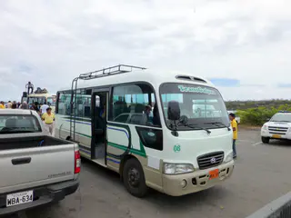 Our Red Mangrove bus awaits on Santa Cruz for the drive across the Island to Puerto Ayora.