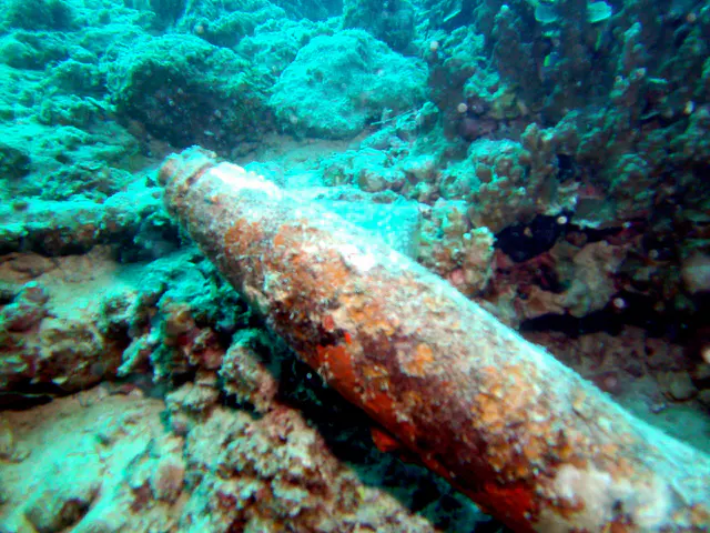 The tip of the bomb is lit by my flash.  The bomb lies near the Japanese LST wreckage.