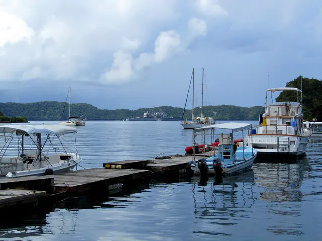 One of the Sam's Tours docks, with its dive boats departed for the day, looking out toward the USS Cowpens, a naval ship that moored in the harbor on Jan. 22 for some R & R for its sailors.