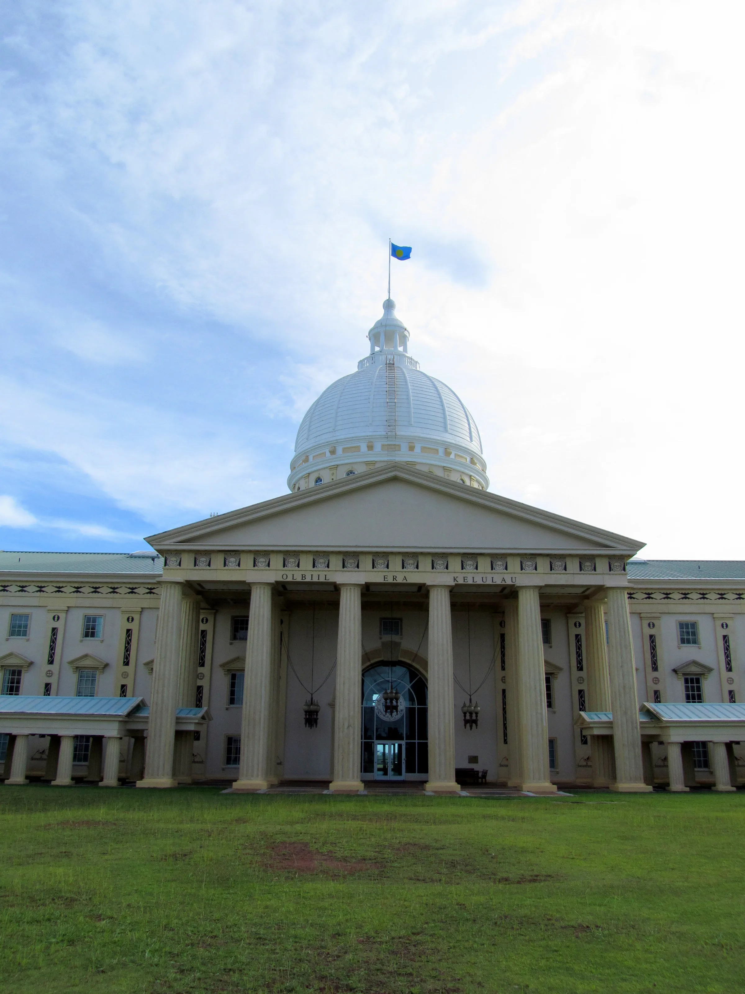 OEK - Palau Legislature. Two houses of the legislature in Palau housed in this Building. Capitol Dome shown.