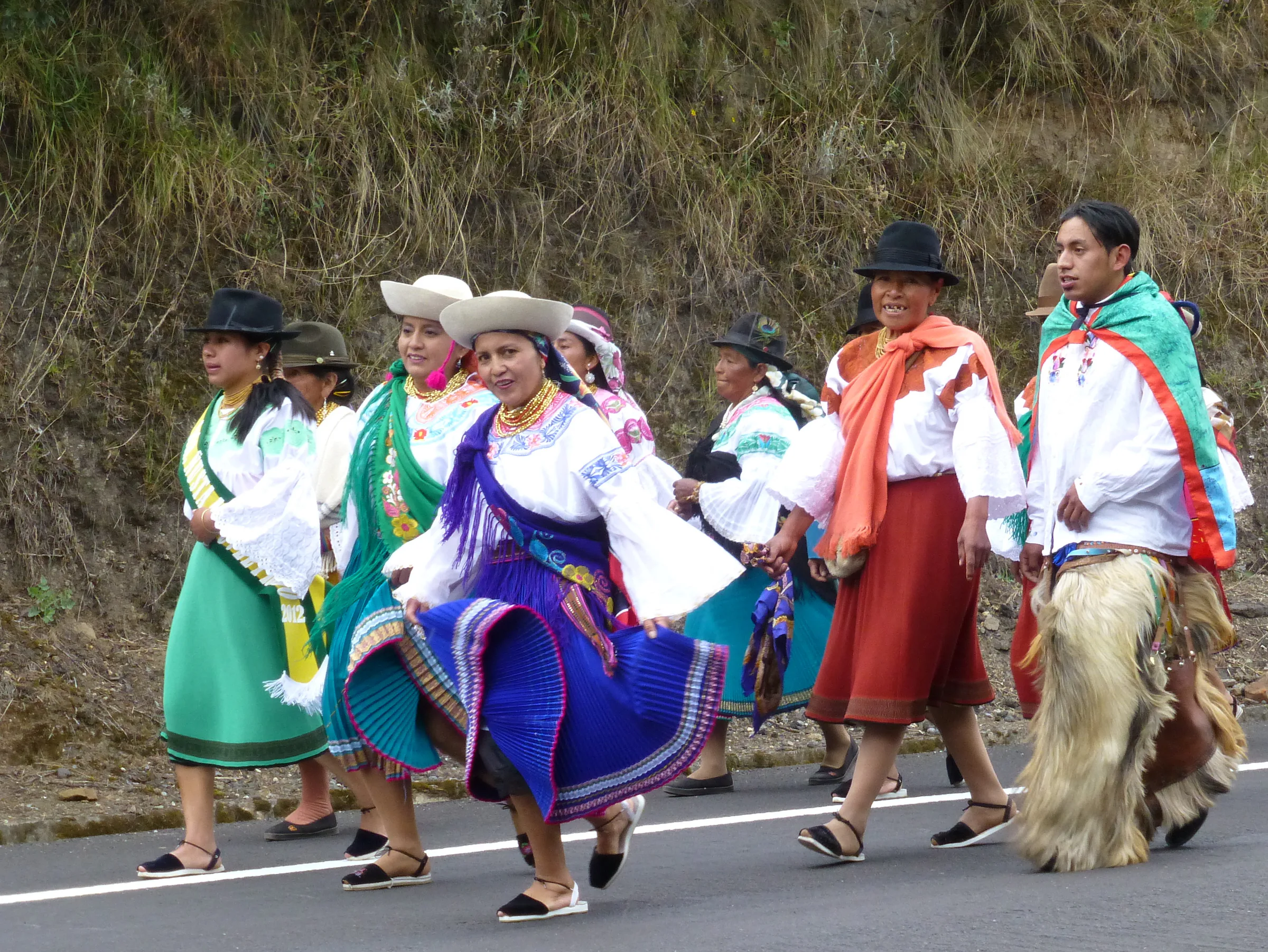 Encountering a fiesta / procession on the road to Otavalo.