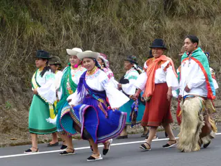 Encountering a fiesta / procession on the road to Otavalo.
