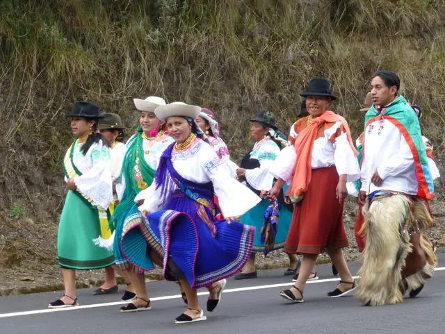 Encountering a fiesta / procession on the road to Otavalo.